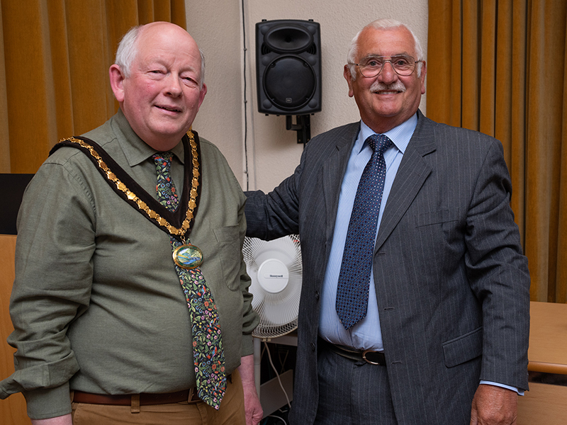 Councillor Burton Civic Chair (left) receiving the chain of office from Graham Elliott