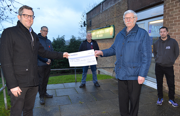 Chevin Homes handing over £5k donation to the Farmer’s View and Hurst Farm community.