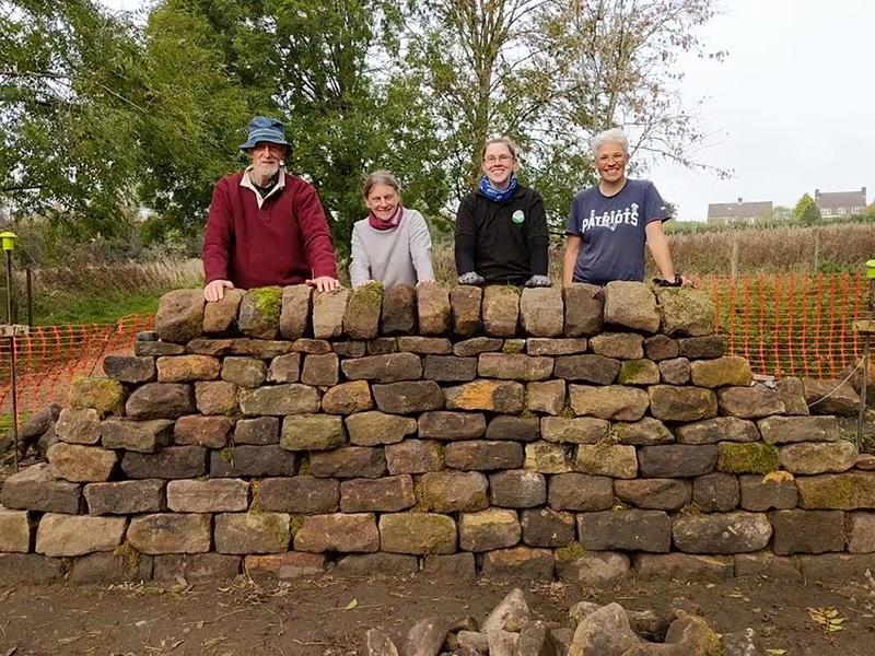 Dry stone walling volunteers Lex, Sarah, Louise and Hannah